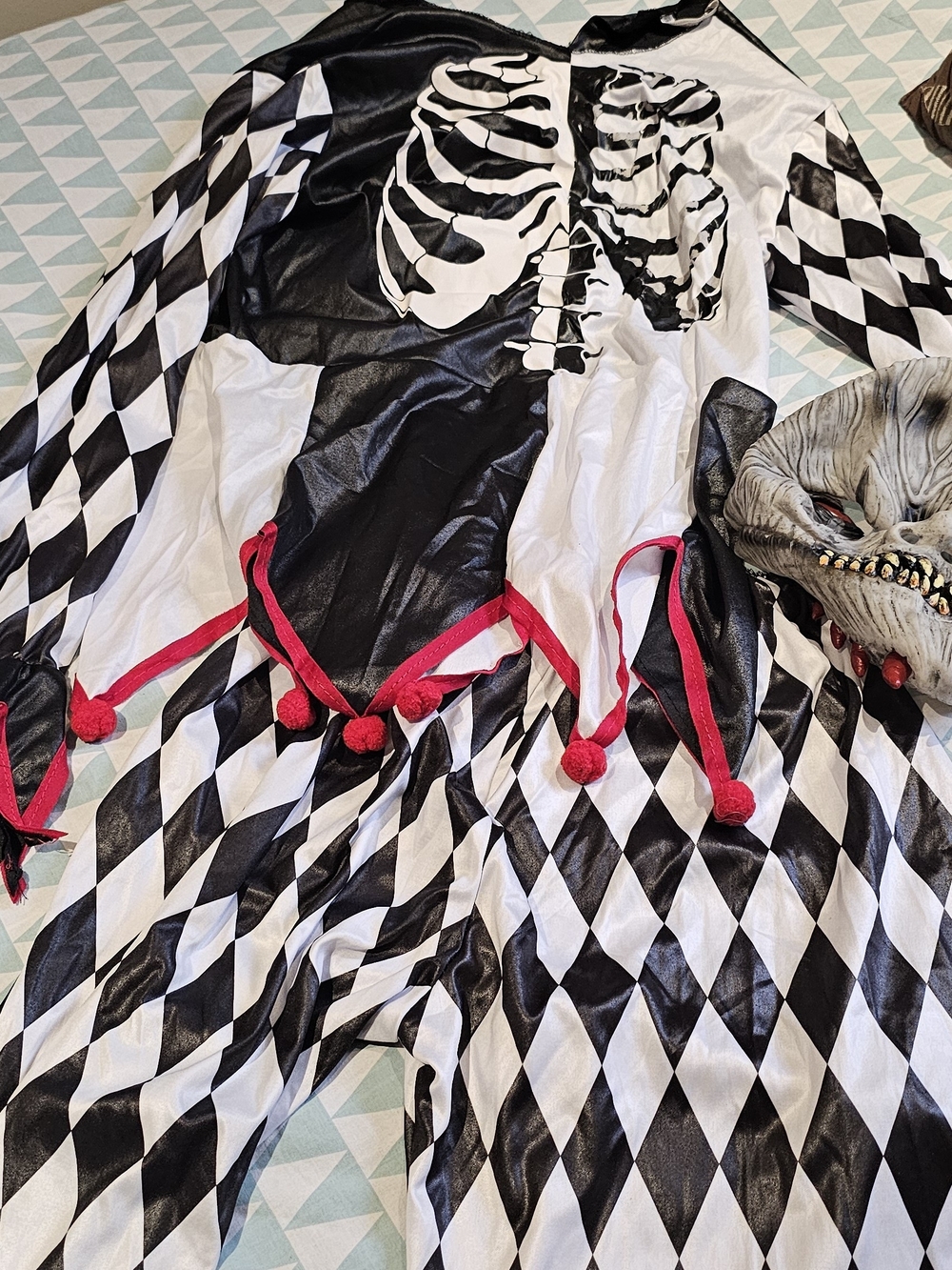 Party City Black & White Harlequin Skeleton Jester Costume with Red Pom Accents
